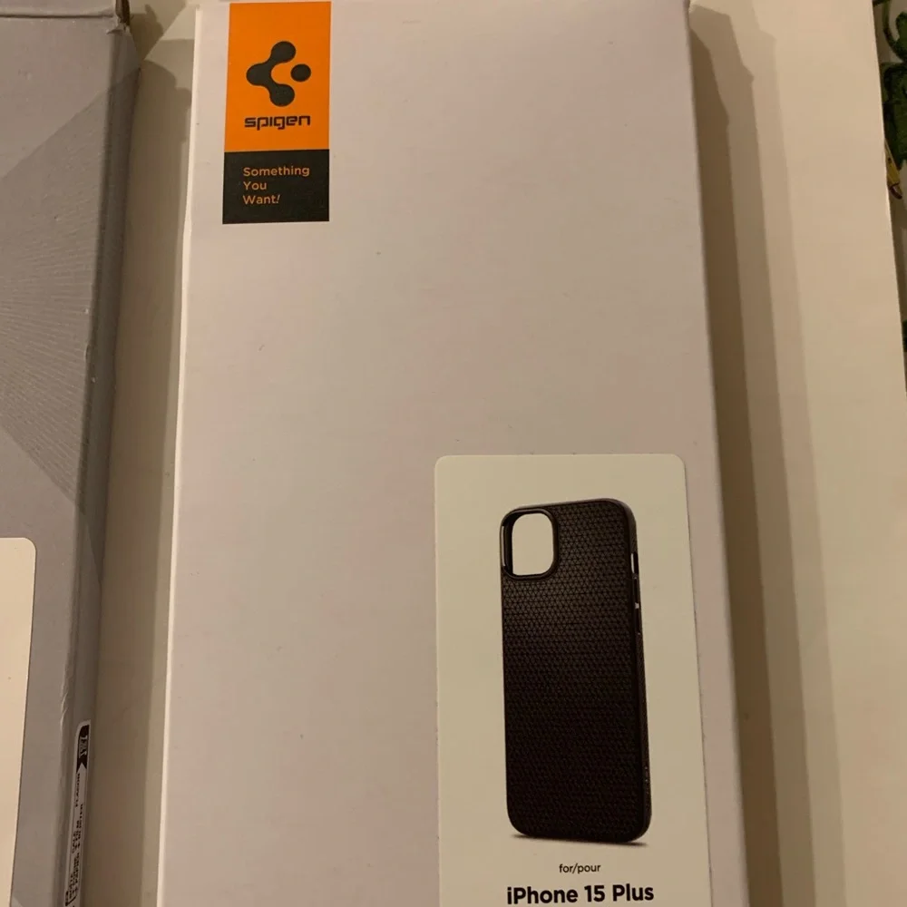 9 Assorted Spigen & Caseology iPhone 14 Plus and iPhone 15 Plus